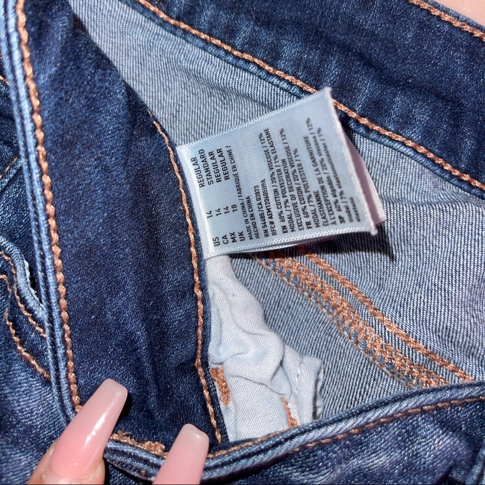 ripped blue american eagle jeans (: